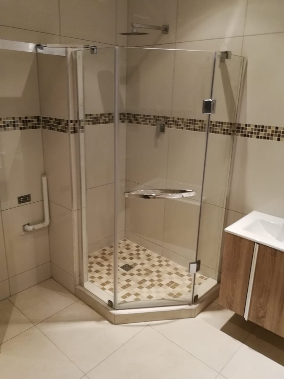 Shower + wall tiling Shower + wall tiling